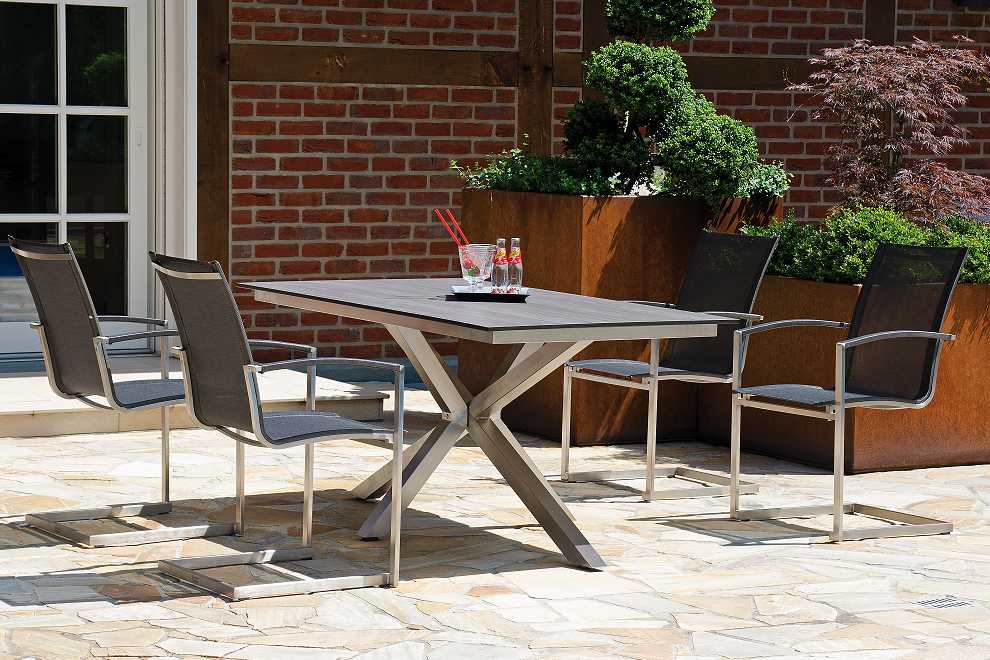 Gartenm�bel Set aus Edelstahl mit Freischwinger Millenium und Tisch Spectra